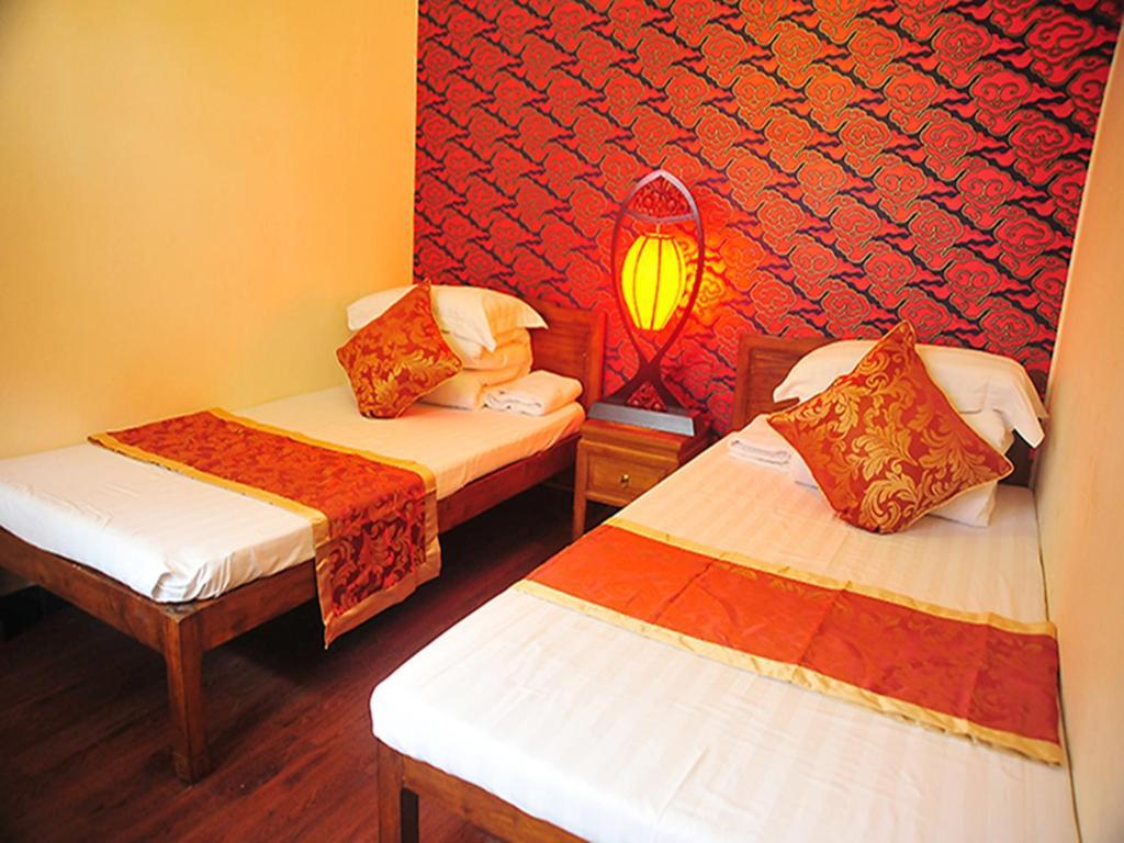 Happy Dragon Courtyard Hostel Πεκίνο Δωμάτιο φωτογραφία